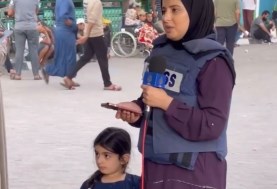 مراسلة  فلسطينية وابنتها