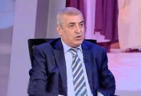 الأستاذ الدكتور حسن المومني عميد كلية الأمير الحسين بن عبدالله الثاني بالأردن 