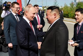 الرئيس الروسي فلاديمير بوتين مع نظيرة زعيم كوريا الشمالية 
